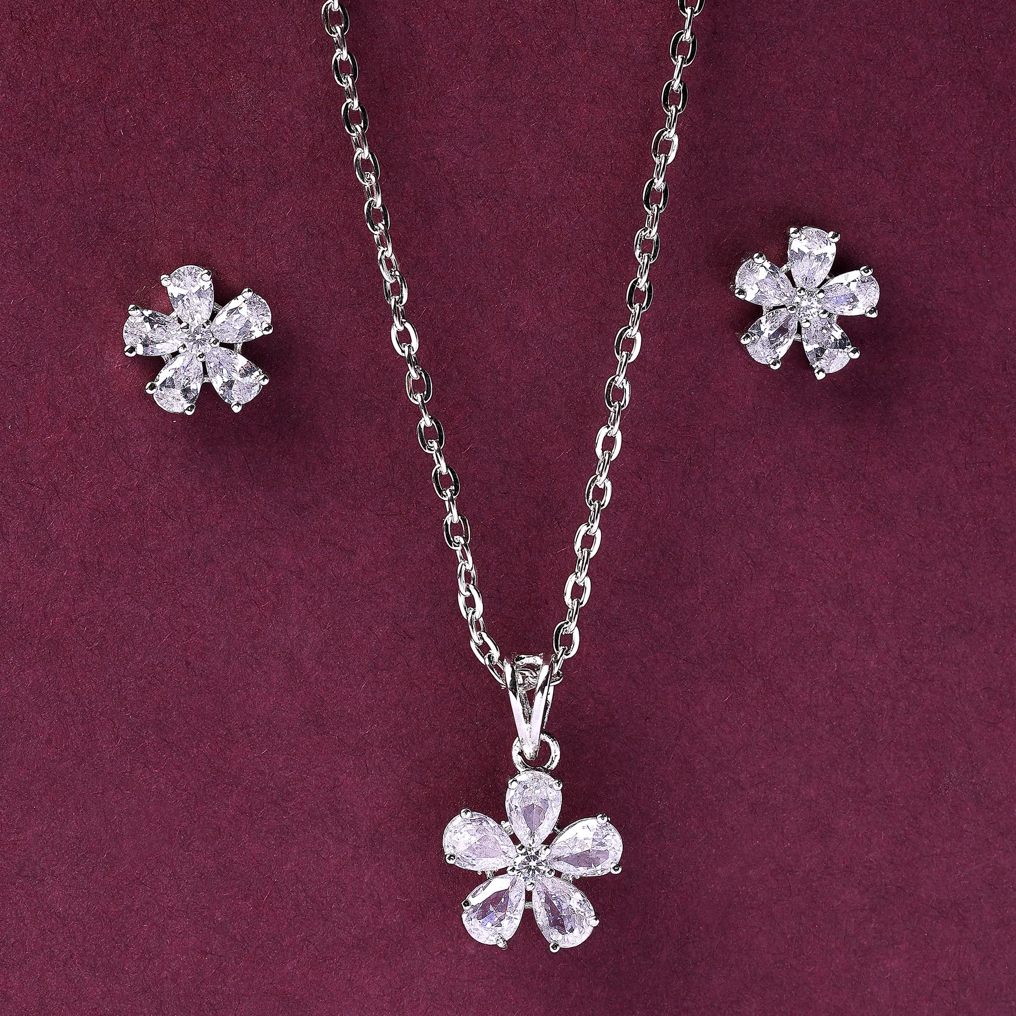 Alorajewels - Rhodium Plated Silver Toned American Diamond Studded Floral Shaped Pendant Chain With Earrings Jewellery Set For Women And Girls